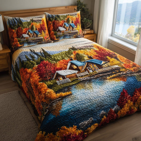Fall Glow quilted 3-piece bedding set on a made bed with two matching pillow shams