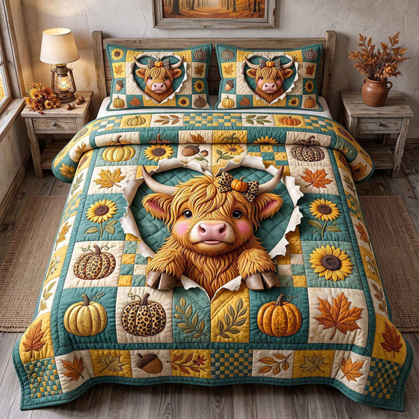 Fall Highland Cow quilted 3-piece bedding set on a made bed with two matching pillow shams