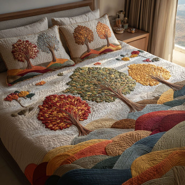 Fall Meadow quilted 3-piece bedding set on a made bed with two matching pillow shams
