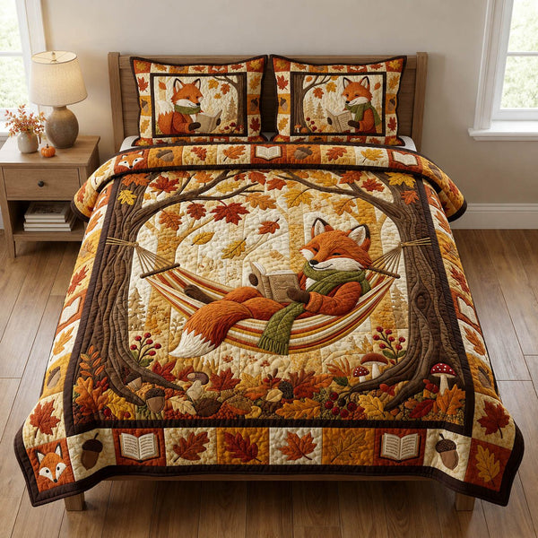 Fall Reading Fox quilted 3-piece bedding set on a made bed with two matching pillow shams