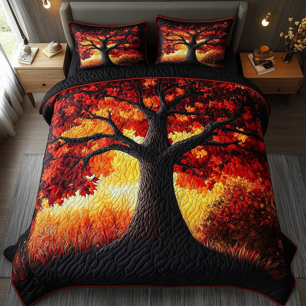 Falling Leaves quilted 3-piece bedding set on a made bed with two matching pillow shams