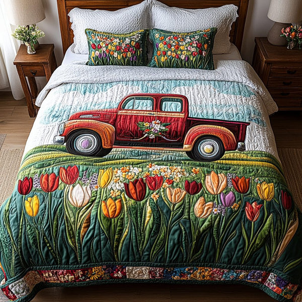 Farm Road Flowers quilted 3-piece bedding set on a made bed with two matching pillow shams