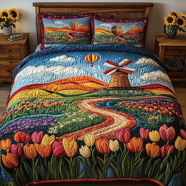 Farmhouse Bloom quilted 3-piece bedding set on a made bed in a farmhouse bedroom