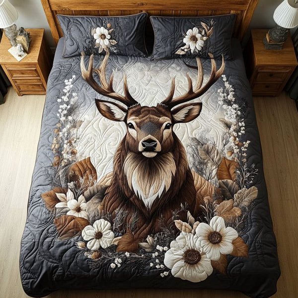 Fawn and Flora Dreams quilted 3-piece bedding set on a made bed with two matching pillow shams