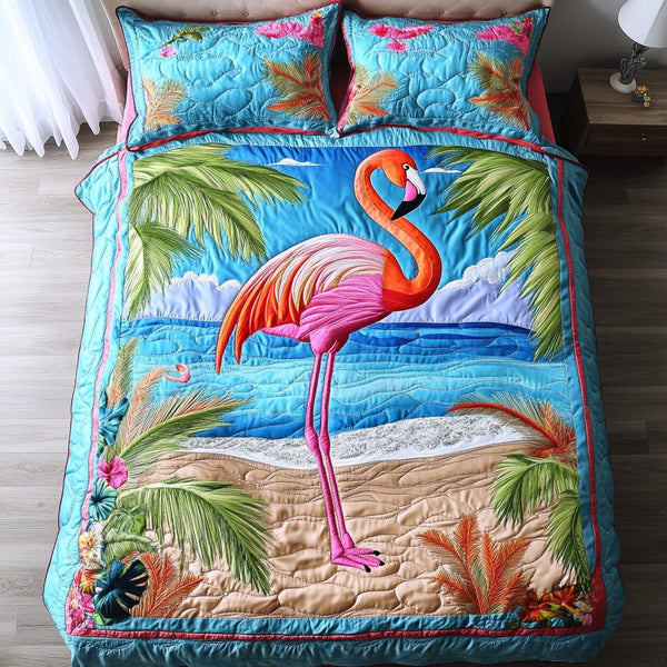 Feathered Beauty quilted 3-piece bedding set on a made bed with two matching pillow shams