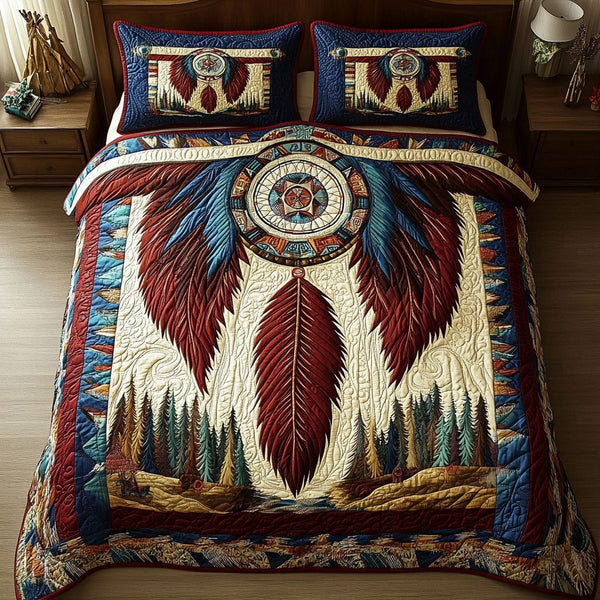 Feathered Blessing quilted 3-piece bedding set on a made bed with two matching pillow shams