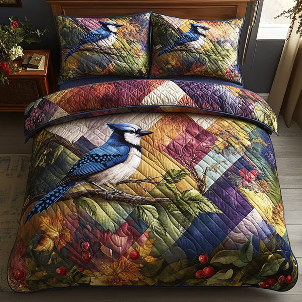 Feathered Elegance quilted 3-piece bedding set on a made bed with two matching pillow shams
