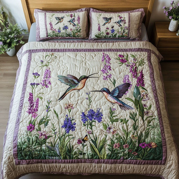 Feathered Flash quilted 3-piece bedding set on a made bed with two matching pillow shams
