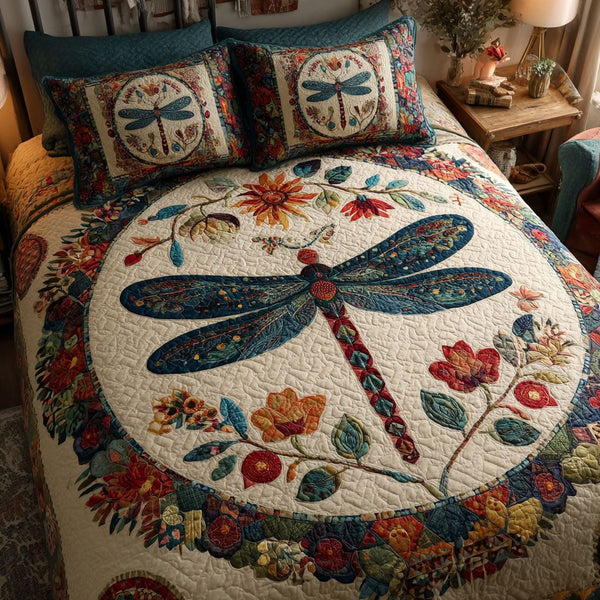 Feathered Flight quilted 3-piece bedding set on a made bed with two matching pillow shams