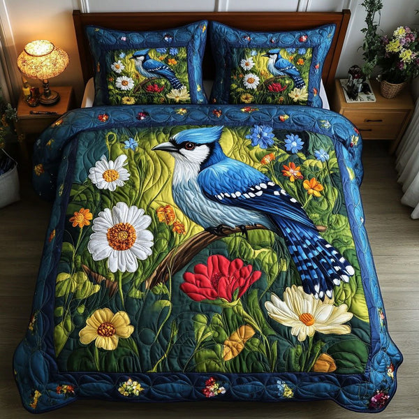 Feathered Garden quilted 3-piece bedding set on a made bed with two matching pillow shams