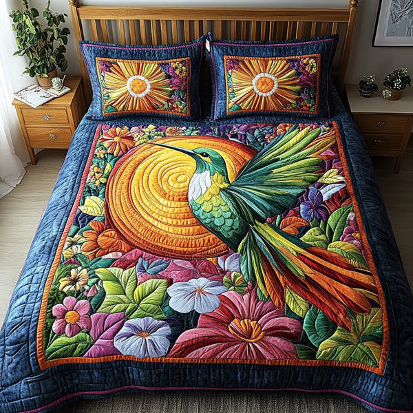 Feathered Garden quilted 3-piece bedding set on a made bed with two matching pillow shams