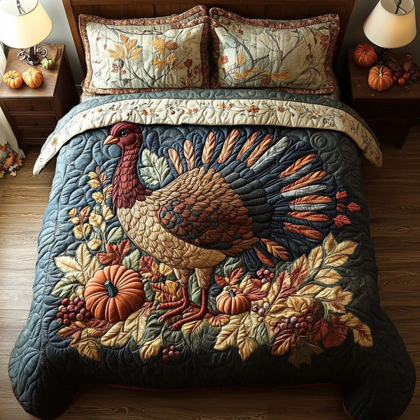 Feathered Harvest quilted 3-piece bedding set on a made bed with two matching pillow shams