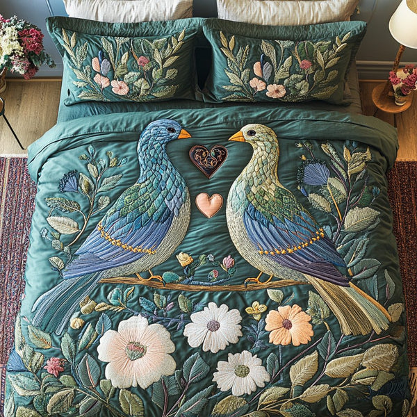 Feathered Love quilted 3-piece bedding set on a made bed with two matching pillow shams