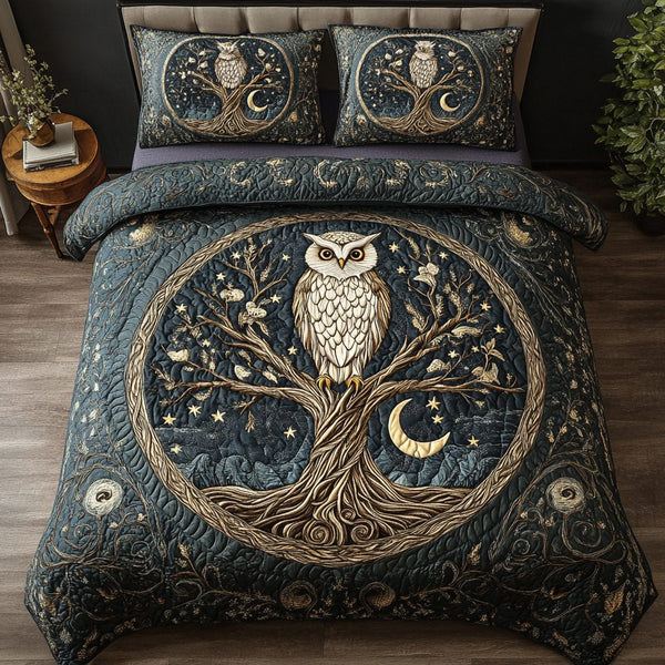 Feathered Wisdom quilted 3-piece bedding set on a made bed with two matching pillow shams