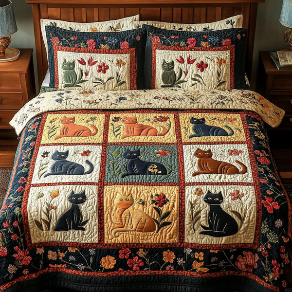 Feline Comfort quilted 3-piece bedding set on a made bed with two matching pillow shams