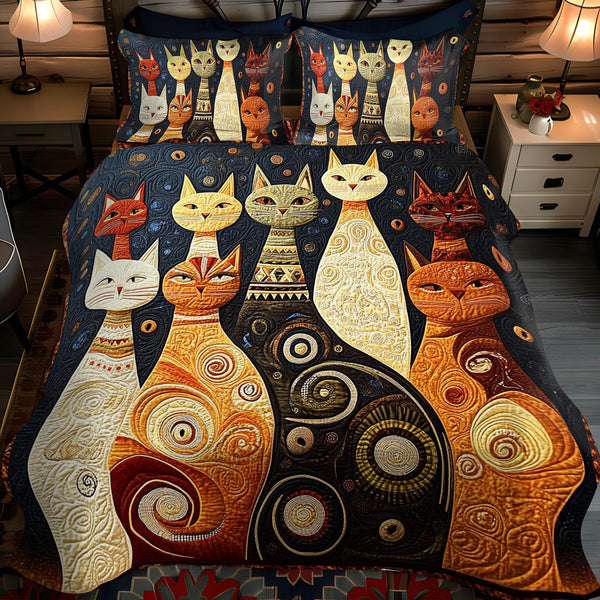 Feline Comfort quilted 3-piece bedding set on a made bed with two matching pillow shams