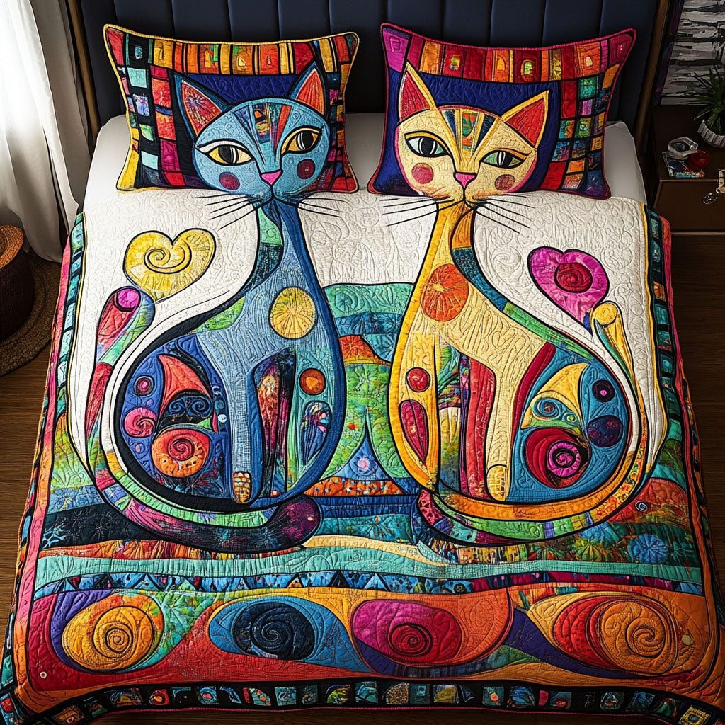 Feline Fine Love quilted 3-piece bedding set on a made bed with two matching pillow shams