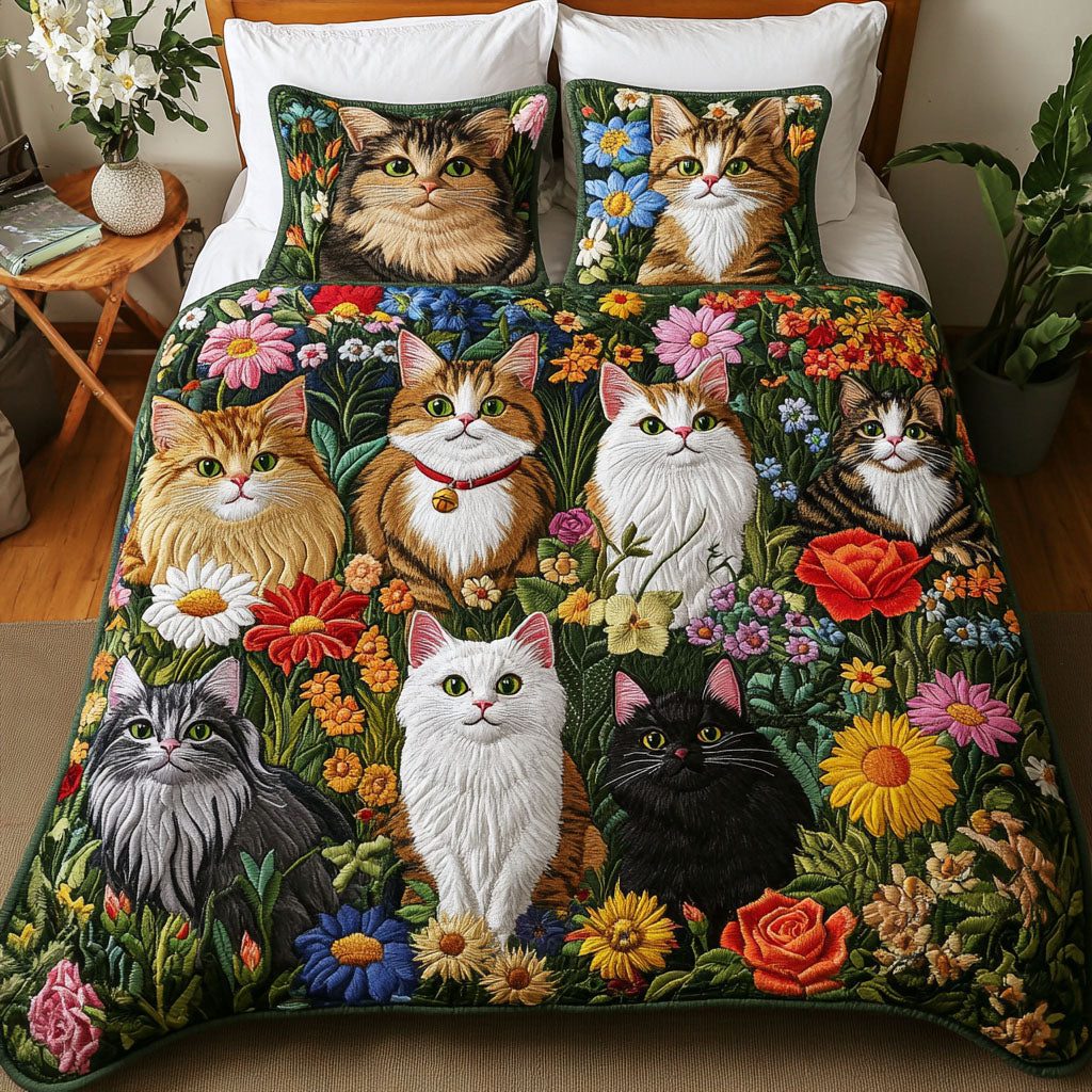Feline Frolic quilted 3-piece bedding set on a made bed with two matching pillow shams