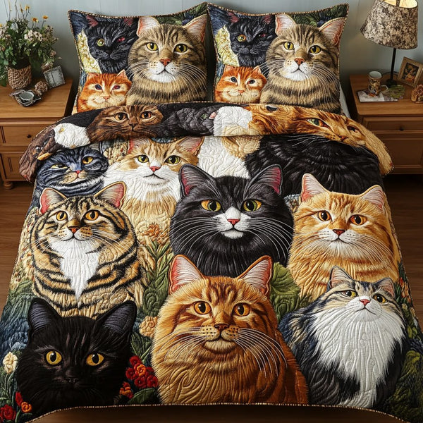 Feline Whisper quilted 3-piece bedding set on a made bed with two matching pillow shams