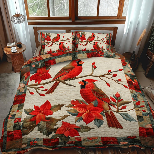 Festive Cardinal quilted 3-piece bedding set on a made bed in a winter-styled bedroom
