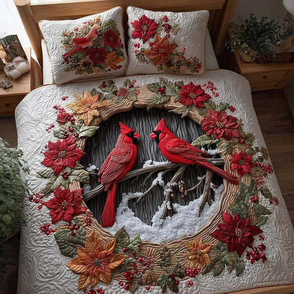 Festive Feathered Nest quilted 3-piece bedding set on a made bed in a winter-styled bedroom