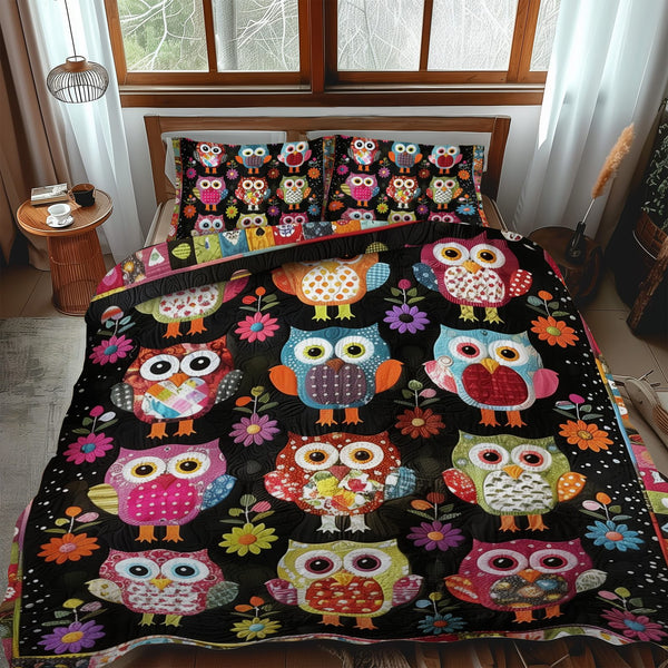 Fetching Owls quilted 3-piece bedding set on a made bed with two matching pillow shams