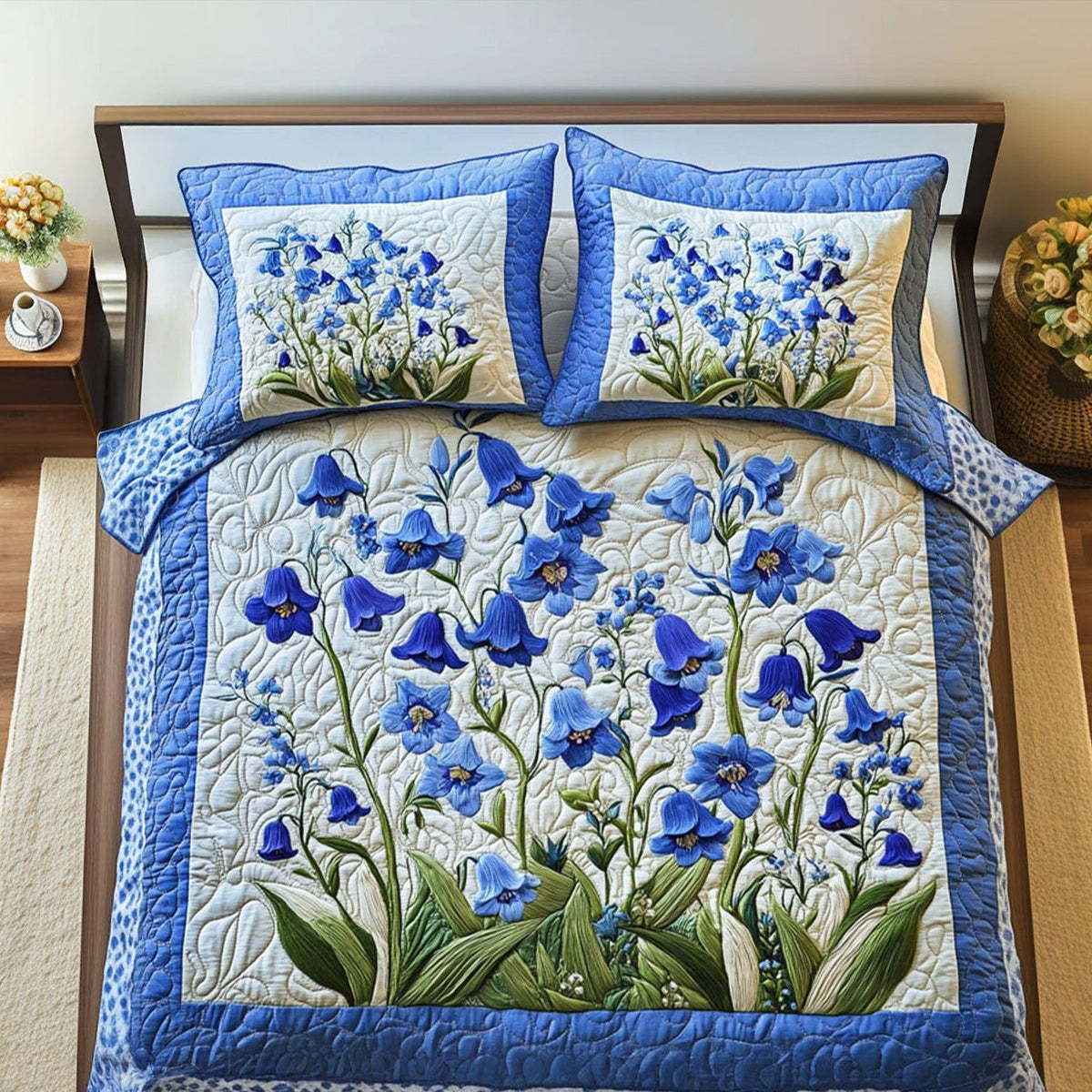 Fields of Blue quilted 3-piece bedding set on a made bed with two matching pillow shams