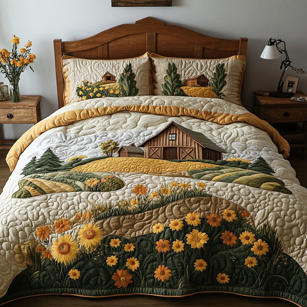 Fields of Gold quilted 3-piece bedding set on a made bed with two matching pillow shams