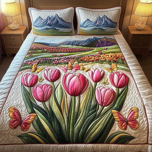 Fields of Tulips quilted 3-piece bedding set on a made bed with two matching pillow shams