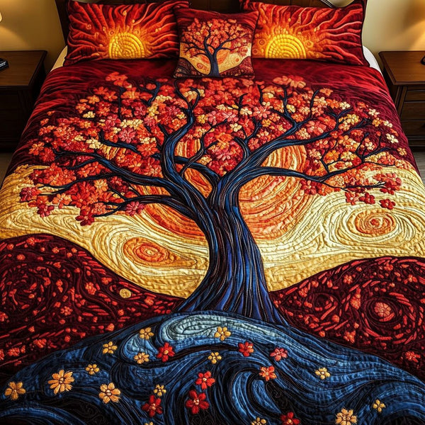 Fiery Blossom Tree quilted 3-piece bedding set on a made bed with two matching pillow shams
