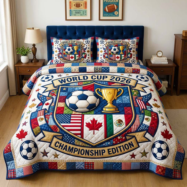 Final Glory quilted 3-piece bedding set on a made bed with two matching pillow shams
