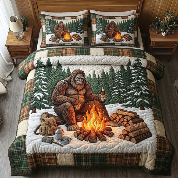 Fireside Bigfoot quilted 3-piece bedding set on a made bed with two matching pillow shams
