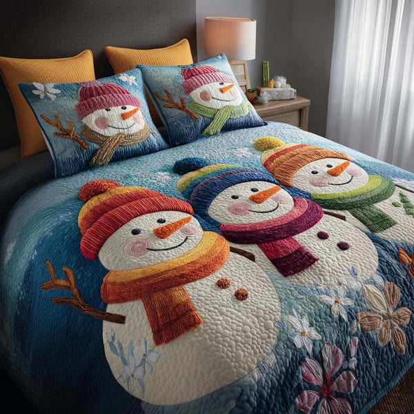First Snow quilted 3-piece bedding set on a made bed with two matching pillow shams