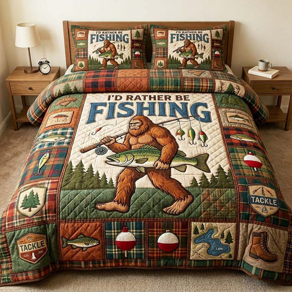 Fishing Sasquatch quilted 3-piece bedding set on a made bed with two matching pillow shams