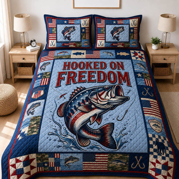 Fishing US quilted 3-piece bedding set on a made bed with two matching pillow shams