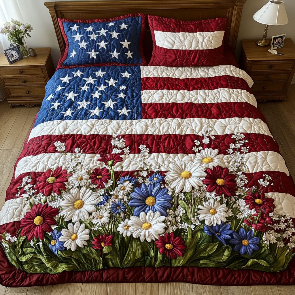 Flag and Flowers quilted 3-piece bedding set on a made bed in a warmly lit bedroom