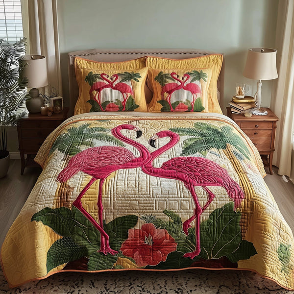 Flamingo Bliss quilted 3-piece bedding set on a made bed with two matching pillow shams