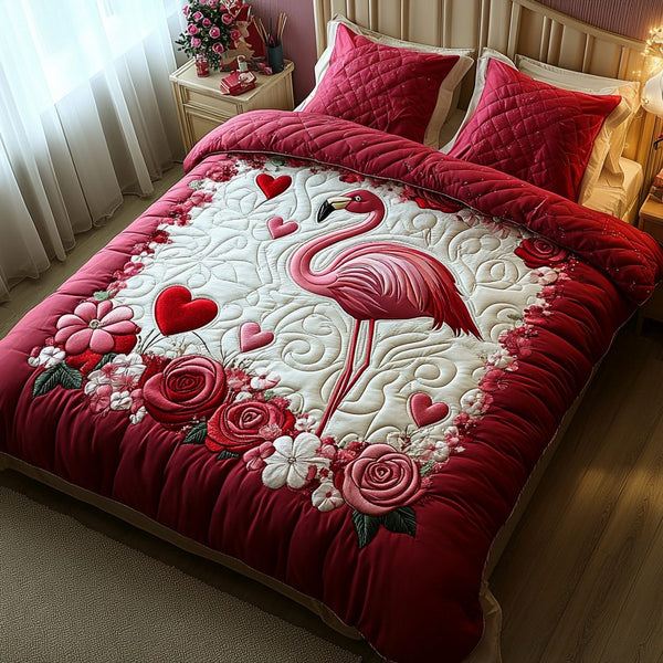 Flamingo Bliss quilted 3-piece bedding set on a made bed with two matching pillow shams