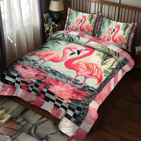Flamingo Bliss quilted 3-piece bedding set on a made bed with two matching pillow shams