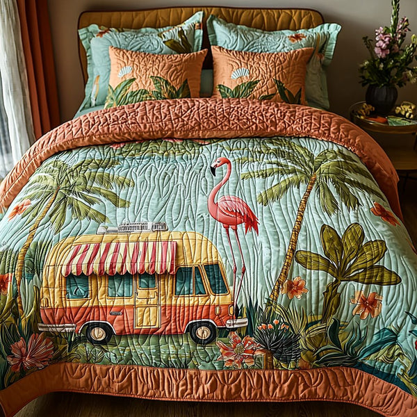 Flamingo Camping quilted 3-piece bedding set on a made bed with two matching pillow shams