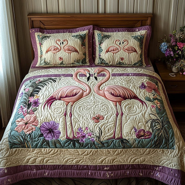 Flamingo Couple quilted 3-piece bedding set on a made bed with two matching pillow shams