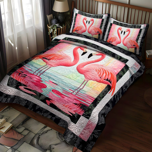 Flamingo Dreams quilted 3-piece bedding set on a made bed with two matching pillow shams