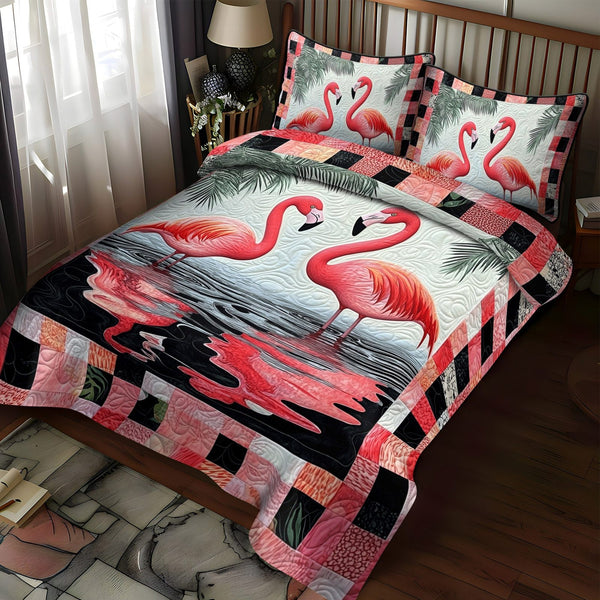 Flamingo Gala quilted 3-piece bedding set on a made bed with two matching pillow shams