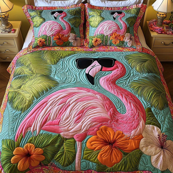 Flamingo Garden quilted 3-piece bedding set on a made bed with two matching pillow shams