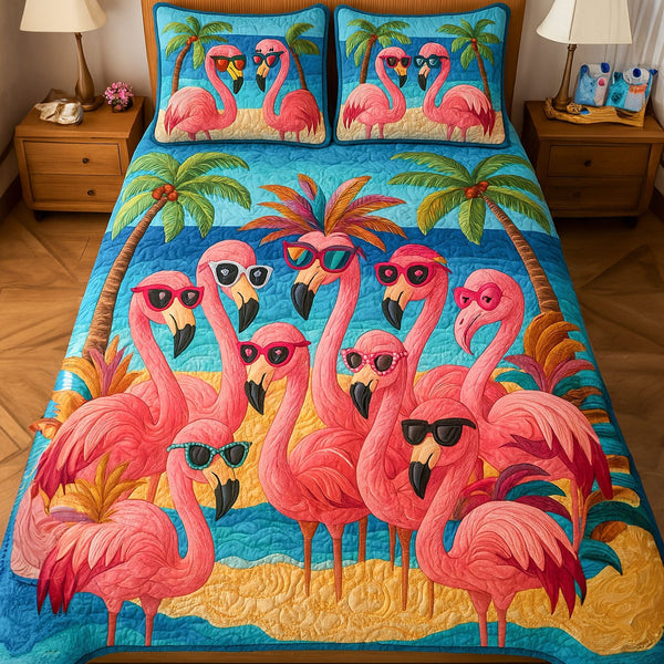 Flamingo Gathering quilted 3-piece bedding set on a made bed with two matching pillow shams