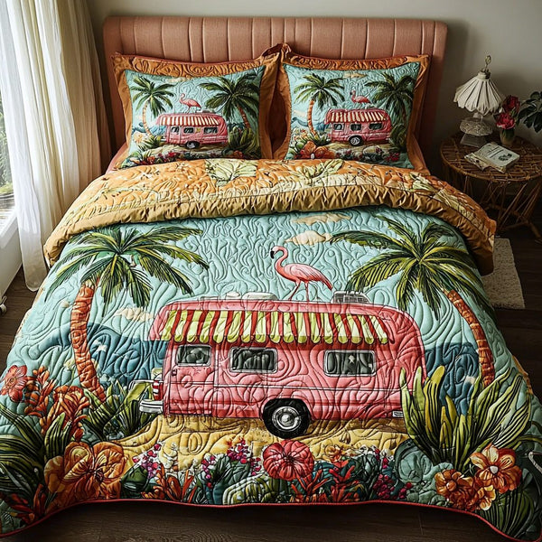 Flamingo Hangout quilted 3-piece bedding set on a made bed with two matching pillow shams
