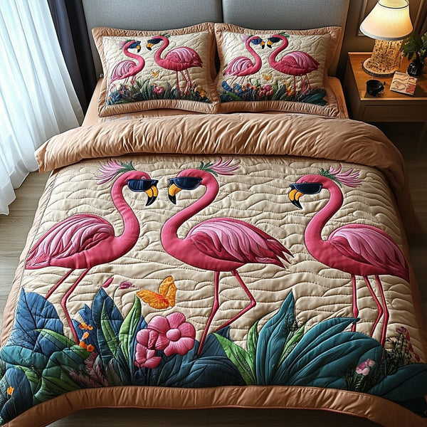 Flamingo Haven quilted 3-piece bedding set on a made bed with two matching pillow shams