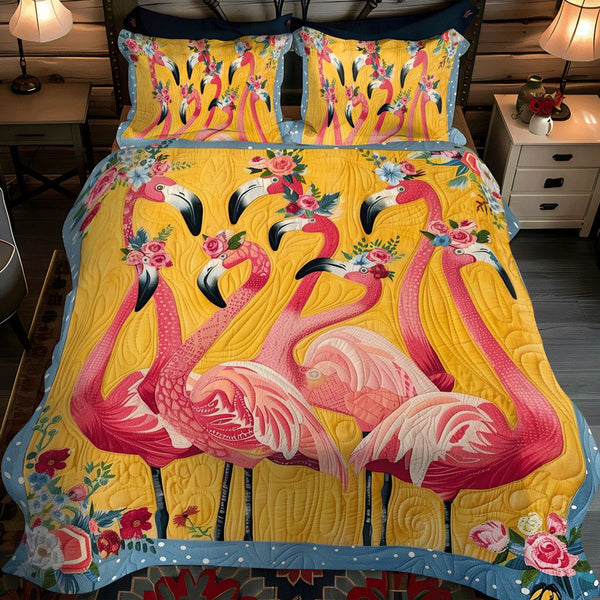 Flamingo Oasis quilted 3-piece bedding set on a made bed with two matching pillow shams
