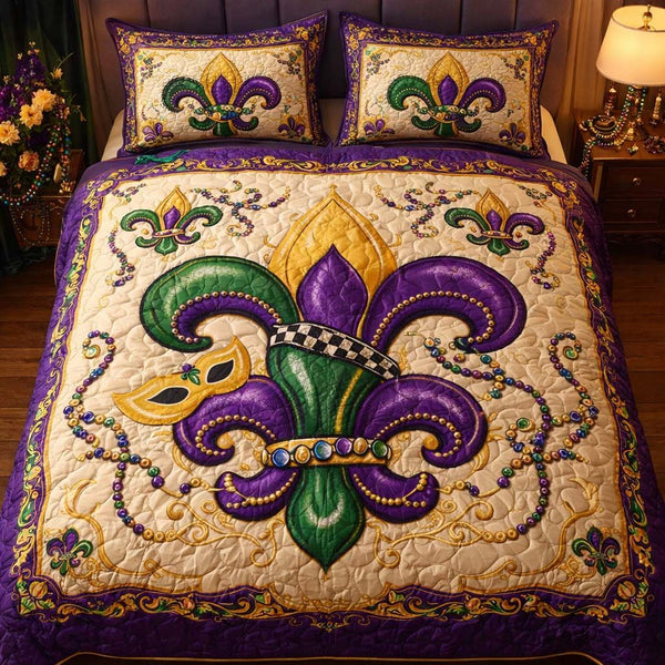 Fleur De Lis quilted 3-piece bedding set on a made bed with two matching pillow shams