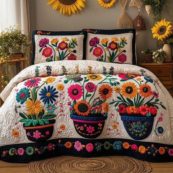 Fleur Serenity quilted 3-piece bedding set on a made bed with two matching pillow shams